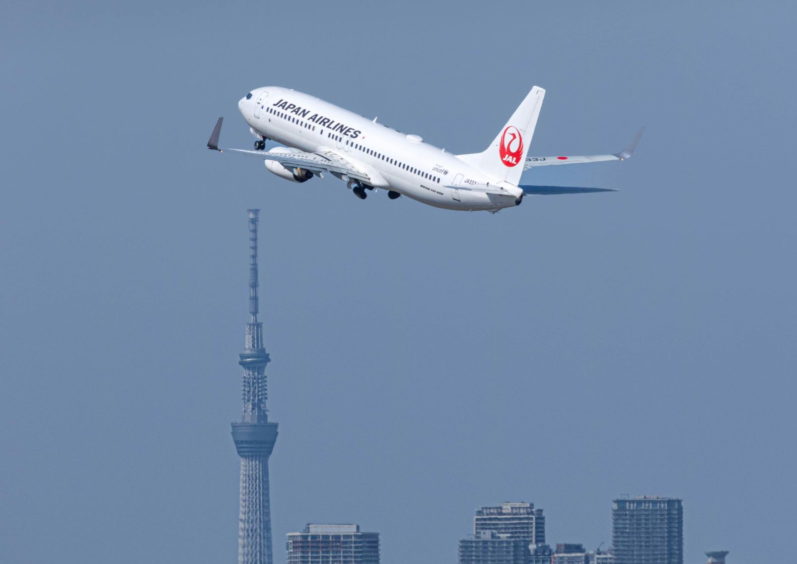 Aereo in volo sopra Tokyo, Giappone